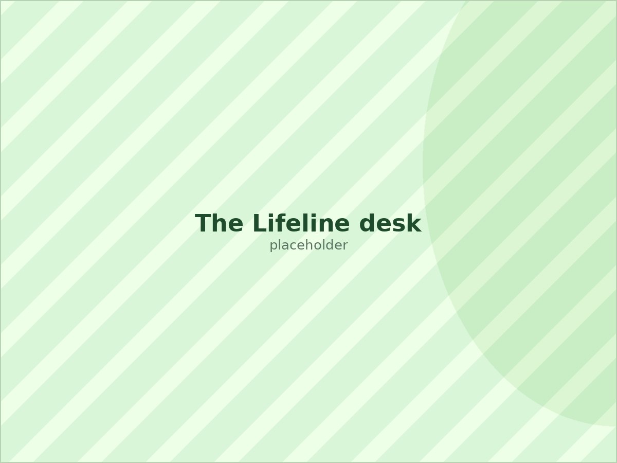 A Lagos MiND counsellor taking a call at the Lifeline desk
